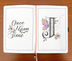 an open notebook with the words once upon time on it