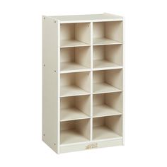 a white bookcase with six shelves on each side