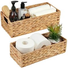 two wicker baskets with toilet paper, soap, and other bathroom items in them