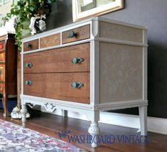 an old dresser is painted white and brown