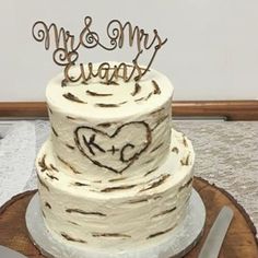 a wedding cake with the words mr and mrs on it