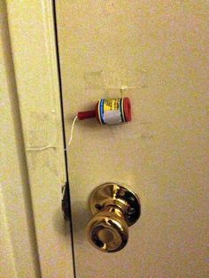 a door handle with the words confetti popper on it and an empty bottle