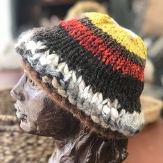 "I did something new... I had many small balls of yarn that I've collected from many projects, and I thought...🤔 Why not make a hat with these hand spun yarns!?... So I did! I'll call this \"The Rag Hat\". I hand knitted the hat: Llama, Alpaca, Mohair, wool and camel. Also, you'll see a little sparkly in the deep brown. That's \"Angelina\". Most of these fibers were processed  at our Oklahoma Mini Mill, which means that most of them were locally raised. The hat weighs 4 ounces and is definitely a one-of-a-kind!🤗" Bohemian Knitted Yarn Hats, Bohemian Mini Hats For Winter, One Size Wool Knitted Hats, Wool Knitted Hats One Size, Bohemian Yarn Mini Hats For Winter, Bohemian Knitted Short Brim Hat, Handmade Bohemian Hats In Acrylic Yarn, Adjustable Handmade Crochet Hat, Handmade Bohemian Mini Hats For Winter