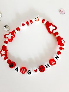 White Adjustable Kawaii Beaded Bracelets, Red Novelty Beaded Bracelets For Friendship, White Beaded Kpop Bracelets, Red Beaded Bracelets With Letter Beads For Birthday, Handmade Red Beaded Bracelets In Novelty Style, Handmade Red Beaded Bracelets, White Letter Beads Bracelet Kpop Style, Handmade White Friendship Bracelets Kpop Style, White Kpop Beaded Bracelets With Letter Beads