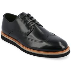 Introducing the Evander derby shoe from Vance Co., a seamless fusion of style and comfort with its 1-inch heel, lace-up closure, and classic round toe design. Crafted from faux leather this style offers a fashionable choice for various occasions. The mesh lining, 6 mm Tru Comfort Foam™ footbed, and rubber outer sole ensure breathability, comfort, and support, making the Evander a versatile and conscious addition to your footwear collection. Black Wingtip Oxfords For Derby, Low-top Laced Oxfords For Derby, Low-top Oxfords For Derby, Plain Toe Oxfords With Laces For Workwear, Classic Black Lace-up Derby Shoes, Formal Derby Shoes With Textured Sole And Lace-up, Formal Lace-up Derby Shoes With Textured Sole, Formal Lace-up Derby With Textured Sole, Black Lace-up Dress Shoes For Derby