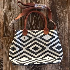 Made Of Foot-Loomed Fabric And Cognac Brown Leather With Double Top Handles, A Cross-Body Strap. Color: Black & White Size: Medium Bag Depth: 5.5" Style: Messenger & Cross Body Bag Height: 10.25" Bag Length: 13.5" Brand: Rachel Zoe Tribe Alive Pattern: Argyle, Diamond Material: Leather Trim, Cloth Bag Nwot White Shoulder Bag With Leather Handles For On-the-go, White Crossbody Hobo Bag With Leather Handles, White Hobo Bag With Leather Handles For On-the-go, White Rectangular Hobo Bag For On-the-go, White Crossbody Hobo Bag For On-the-go, White Crossbody Bucket Bag For On-the-go, White Crossbody Hobo Bag, White Hobo Bag With Leather Handles For Travel, White Crossbody Shoulder Bag With Leather Handles