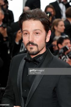 the actor poses for photographers on the red carpet at the opening ceremony of the 72th annual