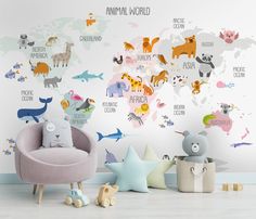 an animal world wall sticker in a child's room with various animals on it