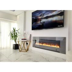 a large television mounted on the wall above a fireplace