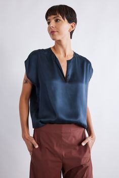 A washable silk top for every day. This top is the most versatile style -- wear it with jeans, dress it up with slacks or a skirt... the options are endless. It has a relaxed fit that will drape effortlessly. Viscose Tops For Daywear, Versatile Silk V-neck Top, Silk V-neck Top, Versatile Rayon Tops For Daywear, Versatile Silk Tops For Summer, Silk Top For Layering In Fall, Silk Tops For Layering In Fall, Silk Top With Relaxed Fit For Work, Elegant Relaxed Fit Rayon Tops