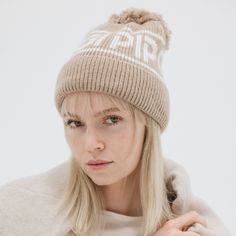 Gigi Pip beanies for women - Jane Retro Pom Beanie - retro inspired pom beanie featuring a limited edition Gigi Pip retro holiday logo [taupe] Winter Resort, Plush Yarn, Retro Ski, Halo Style, Popular Styles, Wearing A Hat, Winter Beanie, Retro Logo, Resort Collection