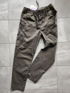 Made in Italy Stone Island Ghost Piece technical cargo pants 32 olive black | eBay Military Olive Cargo Pants With Side Pockets, Utility Olive Parachute Pants With Pockets, Olive Military Cargo Pants With Side Pockets, Olive Military Cargo Pants With Multiple Pockets, Utility Olive Cargo Pants With Side Pockets, Olive Utility Cargo Pants With Side Pockets, Olive Cargo Trousers With Pockets, Military Style Olive Parachute Pants With Pockets, Techwear Khaki Pants With Hip Pockets