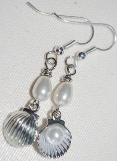 Handmade Earrings: Silver Scallop Shells with Pearls Silver Shell-shaped Pearl Earrings For Gifts, Handmade Silver Shell-shaped Pearl Earrings, Silver Shell-shaped Earrings With Pearl Drop, Wrapping Crystals, Silver Pearl Earrings, Wire Wrapping Crystals, Scallop Shells, Shell Earrings, Jewelry Inspo