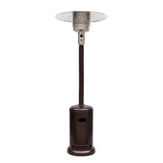 an outdoor patio heater with a glass top on it's side and a metal pole