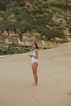 Elegant and sophisticated without sacrificing the coverage you crave-what's not to love about the Magnolia One Piece? We didn't miss a detail with this white one piece swimsuit. You'll love the v-neck style top with functioning tie straps and flattering accent panel to accentuate your shape. This neutral swimsuit features a gray floral on a white background, versatile enough to take you anywhere from a romantic honeymoon to an extended family getaway. *all photos display colors as accurately as Neutral Swimsuit, White One Piece Swimsuit, White One Piece, Romantic Honeymoon, Family Getaways, Extended Family, Swim Skirt, Miss A, Grey Floral