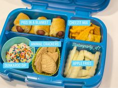 a blue lunch box filled with different types of food and snacks in it's compartments