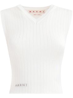 white recycled viscose blend stretch-design ribbed knit appliqué logo V-neck sleeveless cropped straight hem This item is made from at least 50% recycled or upcycled materials. For recycled synthetic clothing products, we highly recommend using a microfibre-catching washing bag to ensure that no microplastics that can pollute water are released in the process. Learn more about what makes a product Conscious on our Conscious Criteria page Versace Outfit, Wardrobe Edit, Yoko London, Upcycled Materials, Knitted Tops, Outerwear Vest, Vest White, Exclusive Fashion, Knit Vest