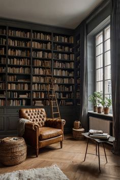 a living room filled with furniture and lots of bookshelves full of books next to a window