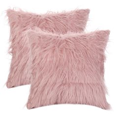 two pink fluffy pillows sitting next to each other