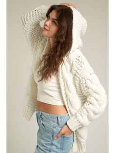 The Callie Cardigan is designed with a hood and fits oversized Oversized Cozy Hooded Jacket, Cozy Knitted Hoodie For Spring, Casual Oversized Sweater Coat In Winter White, Casual Hooded Chunky Knit Outerwear, Casual Oversized Winter White Sweater Coat, Spring Hooded Cable Knit Sweater, Cozy Hooded Chunky Knit Cardigan, Cozy Hooded Cardigan For Loungewear, Cozy Knitted Hooded Cardigan