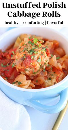 a blue bowl filled with meat and vegetables