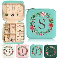 an assortment of personalized jewelry cases with flowers and butterflies on the front, including initial necklaces