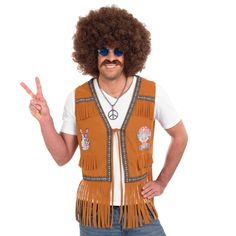 PRICES MAY VARY. Hippie costume vest costume includes fringed brown waistcoat with peace logos. Available in sizes Medium, Large, XL. Please refer to size chart image for further size details. High quality material complete with peace sign logos and tribal patterns. Comfortable for a variety of body types. Founded in 2009 by 3 friends with a passion for costumes, we now have 100s of designs all manufactured to high standards of quality, fit and design. We Have Offices In The US, UK And Europe. P Mens 70s Costume, Hippie Outfits Men, 1960s Fancy Dress, 60s Fancy Dress, Hippy Fancy Dress, Hippy Costume, 70s Fancy Dress, 60s Outfit, Look Hippie