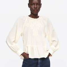 Lightweight Sheer Bloused Top With Delicate Embroidery And Detailing Around Collar And Ruffled Hem, A Pale Blush Cream Color, New With Tag Feminine Embroidered Cream Tops, Feminine Cream Embroidered Tops, Elegant Zara Blouse With Floral Embroidery, Cream Tops With Floral Embroidery, Elegant Embroidered Zara Blouse, Feminine Cream Blouse With Floral Embroidery, Zara Embroidered Casual Blouse, Casual Embroidered Zara Blouse, Zara Casual Embroidered Blouse