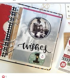 a photo album with the word wishes written on it next to other scrapbooks