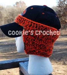 there is a hat on top of a mannequin's head with the word cookie's crochet written across it