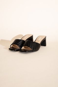 Step into relaxation and style with our Comfortable Wide Fit Mules featuring low block heels. These mules are designed for maximum comfort, catering to a wider fit while maintaining a fashionable edge. With the added support of low block heels, they become a versatile choice for effortless everyday wear, ensuring you stride with confidence and ease.Toe: Open toe, squareHeel shape: Block heelMaterial: SyntheticImported. Made in China Style: Casual Silhouette: N/A Embellishment: Low Heel Length: N Black Mules With Buckle Closure And Open Heel, Fitted Mules With 4-inch Heel And Open Heel, Open Toe Mules With 4-inch Heel, Black Mules With 4-inch Block Heel, Synthetic Open Toe Mules With 4-inch Heel, Mule Heels, Shoe Tags, Low Block Heels, China Fashion