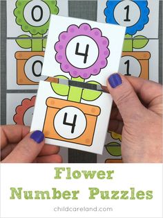 a hand holding a flower number puzzles card