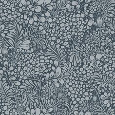 a blue and white floral wallpaper with lots of small flowers on the bottom half of it