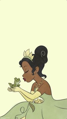 the princess and the frog is holding a frog in her hand while sitting on the ground