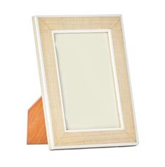 a wooden frame with a white and tan border around it, on a white background