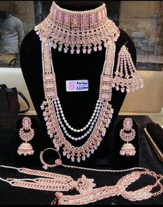 an assortment of jewelry on display in a store