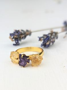 This ring steals the spotlight, with three chunky raw semi-precious gemstones in complimentary colors that wow. The irregular prong settings add sparkle and shine. 18k gold vermeil. Handmade in India No two rings are exactly alike. Stone sizes, shapes and colors may vary slightly from what's shown in the images. Two Rings, Handmade Bath Products, Sparkle And Shine, Rose Jewelry, Complimentary Colors, Amethyst Cluster, Multi Stone Ring, Precious Gemstones, Cluster Ring