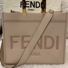 Gorgeous Sunshine Fendi Bag In Light/Pale Pink Color- No Longer Available At The Boutiques. Like Brand New! Excellent Addition To Your Collection. Timeless Piece. You Will Love It And It Will Last Forever. This Is Medium Size: Height: 31 Cm Depth: 17 Cm Width: 35 Cm Fendi 2jours, Fendi Tote Bag, Fendi Casa, Fendi Tote, Pale Pink Color, Fendi Bag, Vintage Fendi, Fendi Peekaboo, Medium Handbags