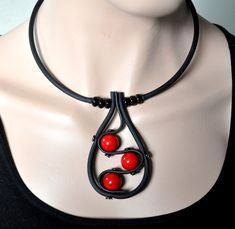 Shop Red and Black Contemporary Necklace,  Rubber Necklace,  Red Coral Glass Pendant Necklace,  Contemporary Jewelry, Unusual Jewelry Looking for contemporary jewelry?  This modern necklace will make a great gift! It made from: -  Black rubber cord -  Stainless steel memory wire -  Black onyx gemstone rondelle beads -  Red coral glass beads -  Silver lobster clasp - Stainless steel extension chain   The length of the necklace is 17", extension chain is 2.5", so total length is 19.5".  This neckl Modern Red Necklace For Gift, Modern Red Necklace Perfect As A Gift, Modern Red Adjustable Necklace, Modern Red Necklace For Party, Modern Red Jewelry For Gifts, Handmade Red Necklace For Evening, Opal Moon Necklace, Steel Extension, Gold Moon Necklace