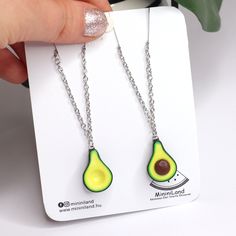 This Avocado Friendship Necklace is the cutest, one of a kind BFF Necklace For 2 that you have been looking for! If you want to share a truly unique gift with your bestie, then you have came to the right place! D E T A I L S: * Two Handmade Avocado Pendant Necklace * Made from Polymer Clay * Necklace length: 19.7 inches (50 cm) - Do you prefer a different chain length ? Please let me know in a message! * Avocado Pendant Length: 1 inches (2.5 cm) * Chain material: Stainless steel * Necklace is li Food Necklace, Miniature Food Jewelry, Friendship Necklace, Bff Necklaces, Best Friend Shirts, Best Friend Necklaces, Friendship Necklaces, Food Jewelry, Friend Necklaces