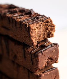 chocolate brownies stacked on top of each other