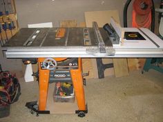 a table saw sits on top of a work bench