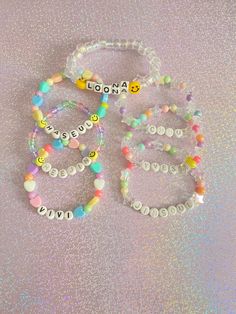 If you stan Loona, then customize your own Loona kpop bracelet! Choose from 4 different designs and select your wrist size below. Check out our kpop jewelry section for more unique designs❤️. *4 different designs available: pastel hearts & beads, clear pastel beads, clear iridescent beads, stars & pastels *Stretchy  *Add a name below in the personalization box If you have any questions, please don't hesitate to ask! We are friendly:) Visit our official website: www.yeetincolorboutique.com and follow us on Instagram: @yeetincolorboutique Affordable White Kpop Beaded Bracelets, Trendy White Jewelry For Personalized Gift, Trendy Beaded Jewelry For Birthday, Trendy Beaded Jewelry For Birthdays, Kpop Pink Beaded Bracelets, Pink Kpop Beaded Bracelets, Pink Beaded Kpop Bracelets, Multicolor Kpop Style Jewelry Gift, Multicolor Round Beads Kpop Jewelry