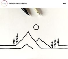 a drawing of mountains and trees on paper with marker pens next to it that says lines and mountains