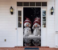 two snowmen standing in front of a white door