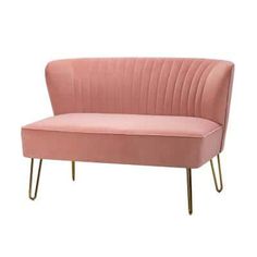 a pink couch with gold legs on a white background