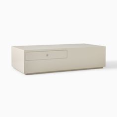 a white box with a drawer on top