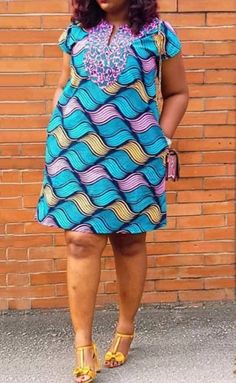 This is made from African print fabric, comfortable to wear. You can dress up or dress down with this fashionable dress.  Its available in different fabrics. Kindly check the size measurements before making your order.  If you have any questions, concern or you have your specific measurements.  kindly send us a message. We are happy to help. Your fashion is our business. NOTE. THE PRIMARY COLOR IS OUT OF STOCK Thank you so much for stopping by, hope you find something nice to order from us. Cheers African Loose Dresses For Women, Loose African Print Dress, Loose Dresses For Women, Plus Size African Dresses, Short Loose Dress, Casual Gowns, Ankara Clothing, Best African Dresses, Short African Dresses