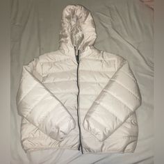 Never Worn Cream Hooded Nylon Outerwear, Cream Nylon Hooded Outerwear, Cream Nylon Outerwear For Spring, Spring Cream Nylon Outerwear, Casual White Nylon Puffer Jacket, Casual Winter White Nylon Outerwear, Spring Nylon Outerwear In Winter White, Casual Winter White Puffer Jacket For Spring, Cream Puffer Jacket For Spring