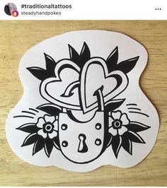 a sticker with an image of a lock and flowers in the shape of a heart